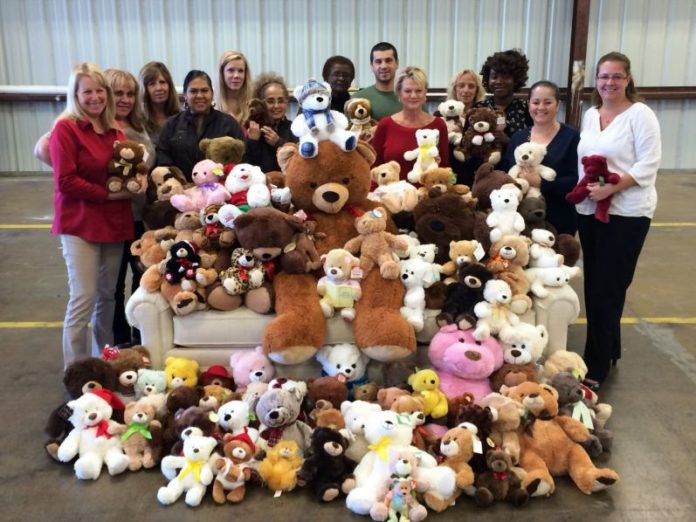 giving teddy bears to charity